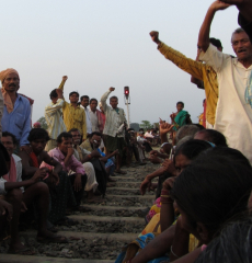 Slogans are chanted from the railway blockade.